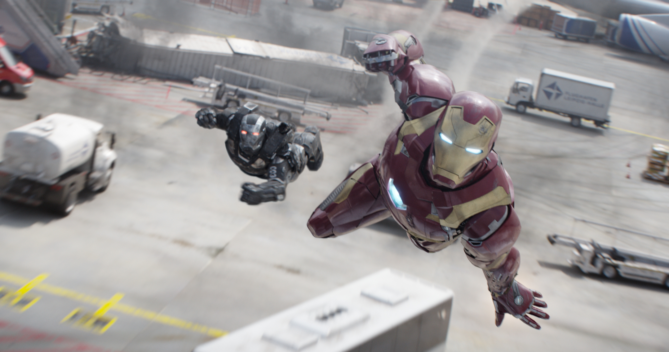 Marvel's Captain America: Civil War..L to R: War Machine/James Rhodes (Don Cheadle) and Iron Man/Tony Stark (Robert Downey Jr.)..Photo Credit: Film Frame..© Marvel 2016